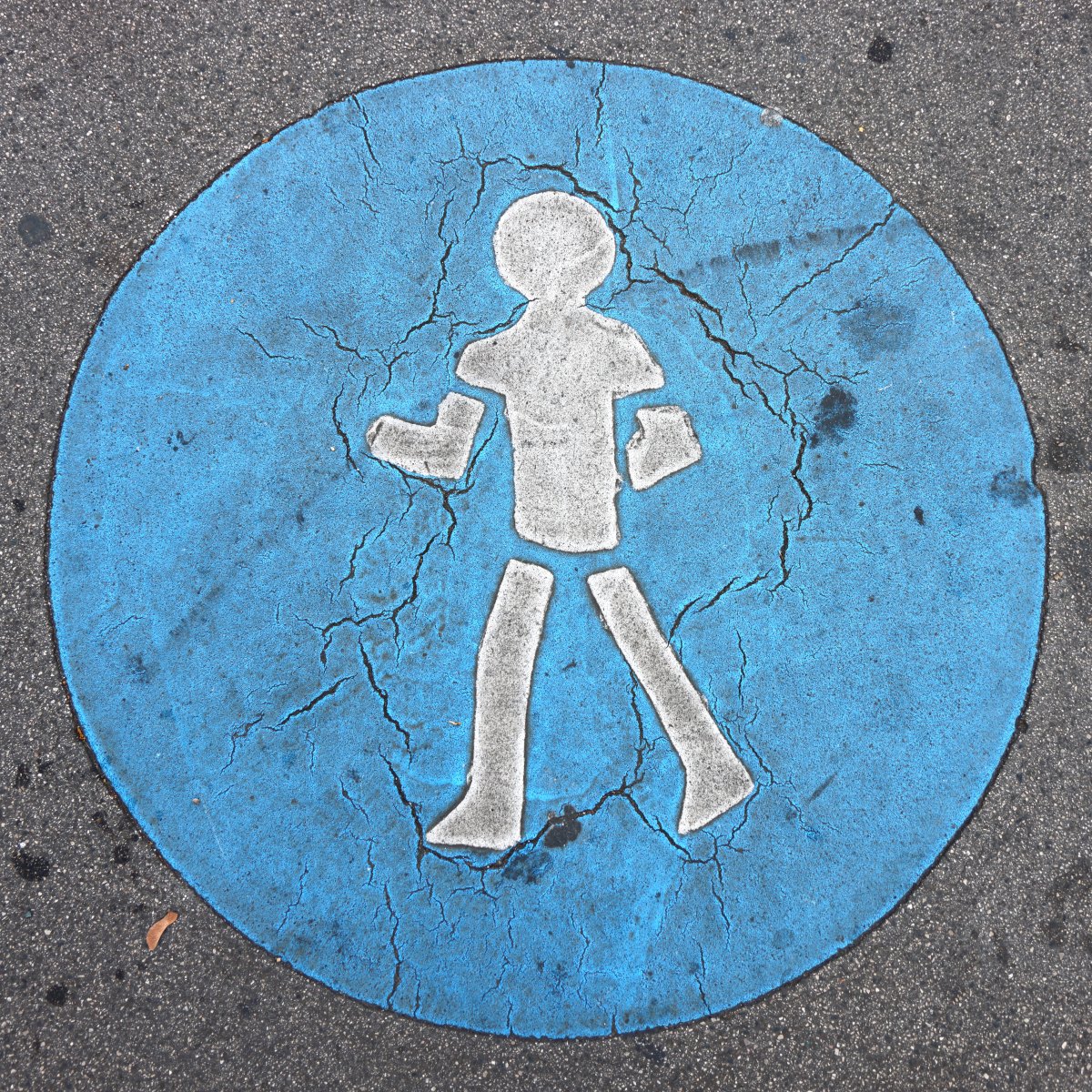 Pedestrian sign on the floor